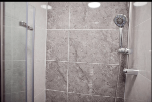 shower with stone tiles